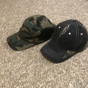Two camo baseball hats
